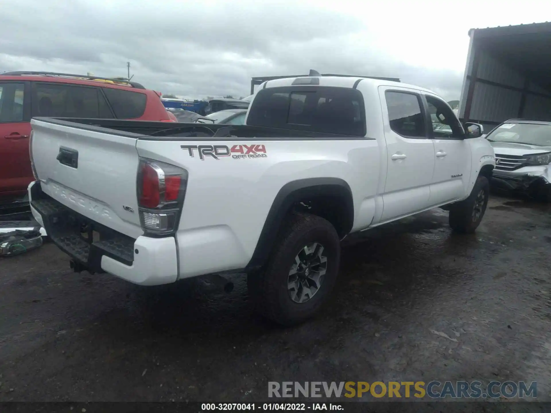 4 Photograph of a damaged car 3TMDZ5BN7MM121026 TOYOTA TACOMA 4WD 2021