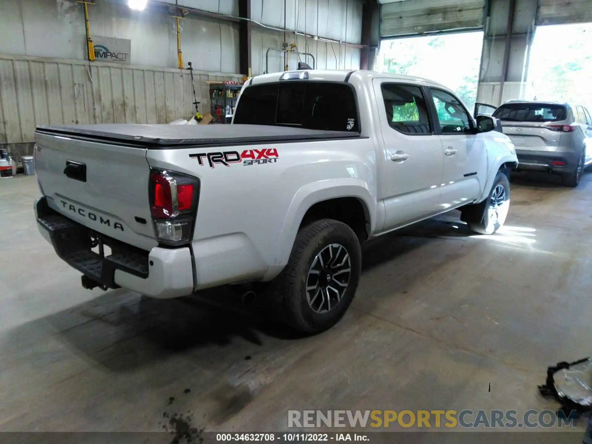 4 Photograph of a damaged car 3TYCZ5AN9MT024220 TOYOTA TACOMA 4WD 2021