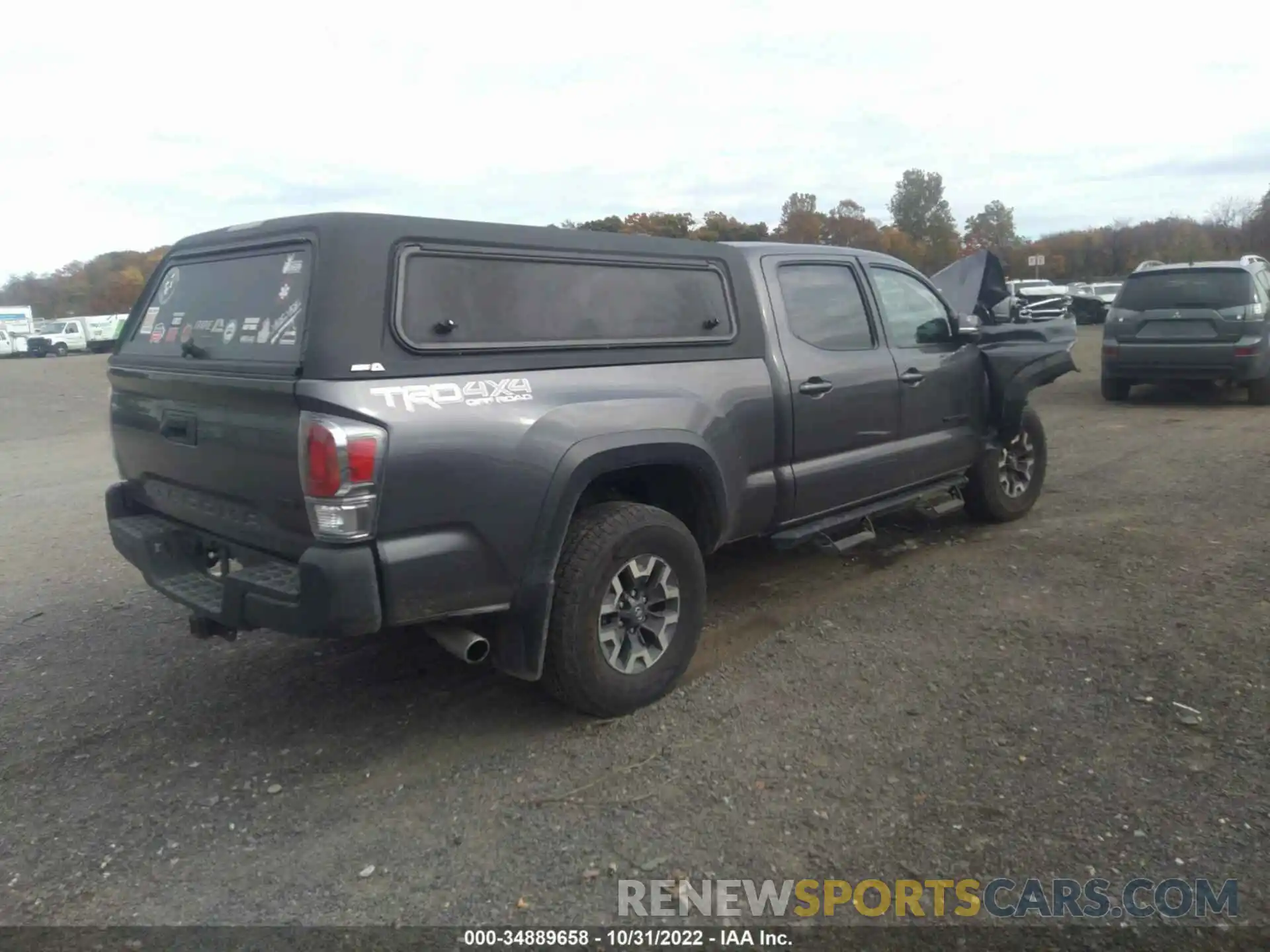 4 Photograph of a damaged car 3TYDZ5BN3MT002314 TOYOTA TACOMA 4WD 2021