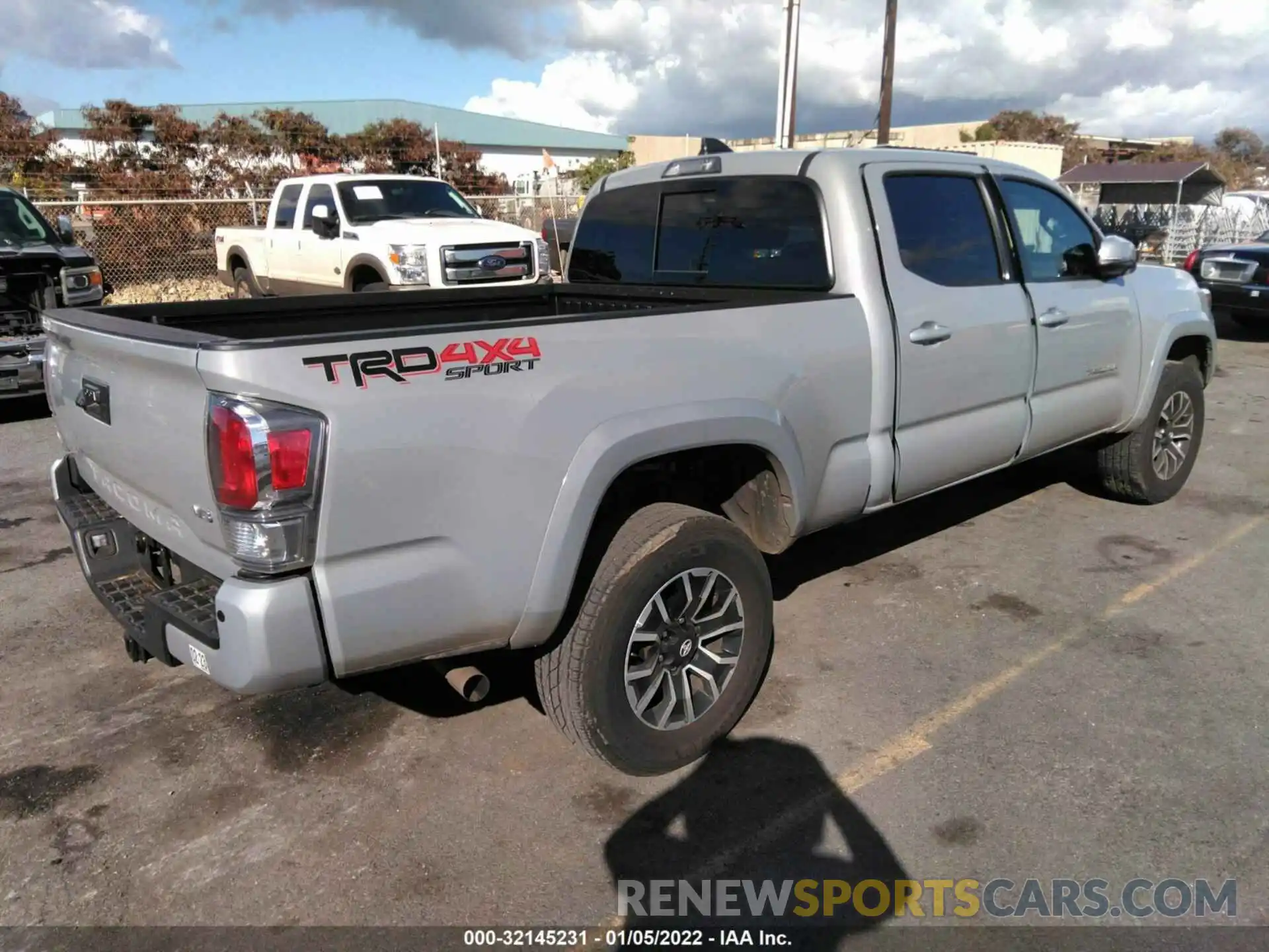 4 Photograph of a damaged car 3TYDZ5BN6MT001433 TOYOTA TACOMA 4WD 2021