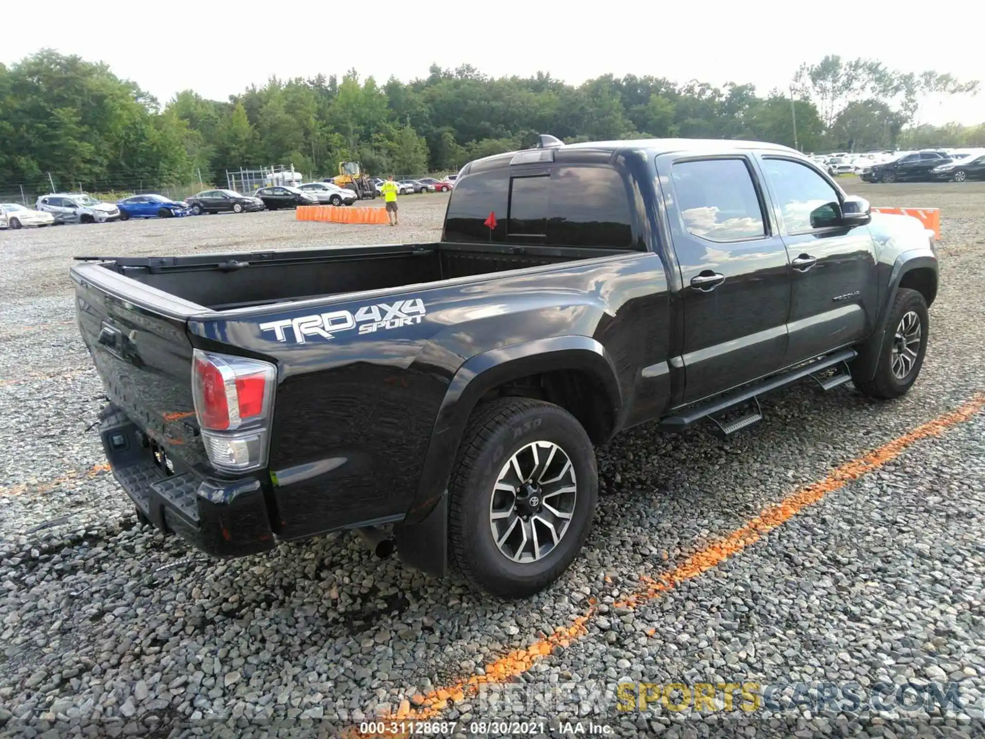 4 Photograph of a damaged car 3TYDZ5BNXMT000656 TOYOTA TACOMA 4WD 2021