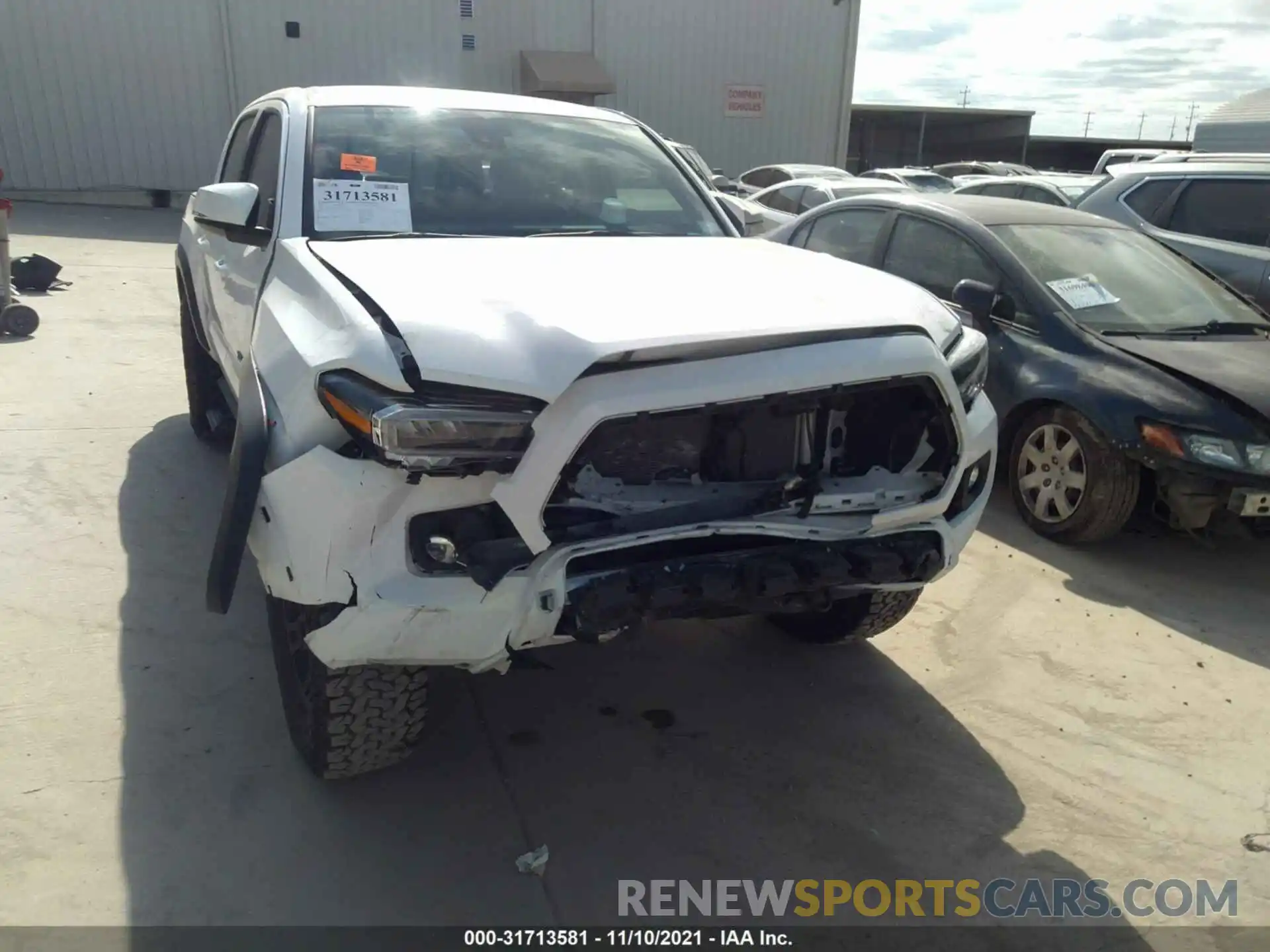 6 Photograph of a damaged car 5TFCZ5AN0MX255769 TOYOTA TACOMA 4WD 2021