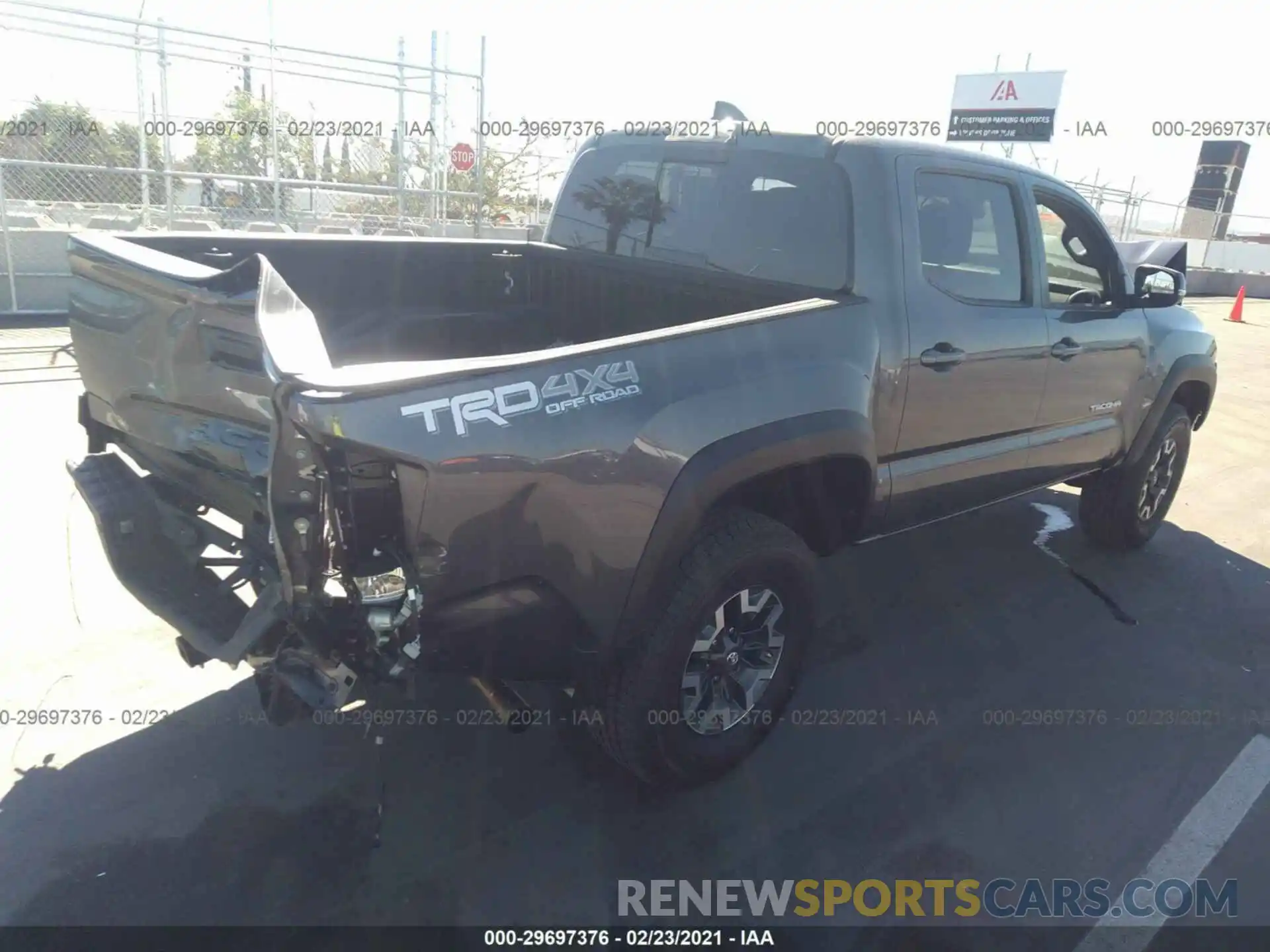 4 Photograph of a damaged car 5TFCZ5AN1MX258146 TOYOTA TACOMA 4WD 2021