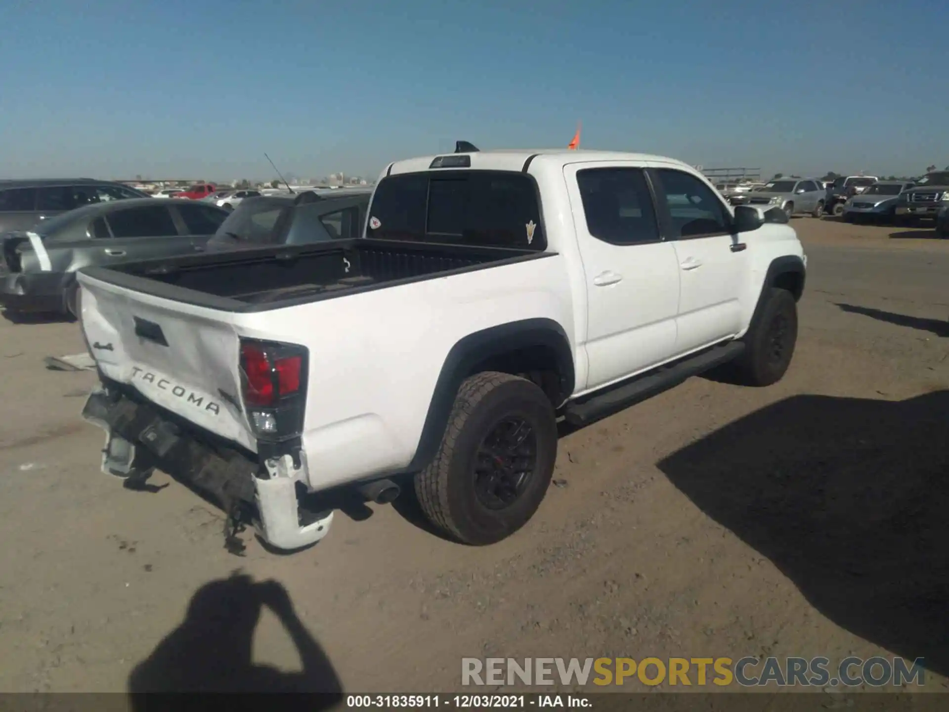 4 Photograph of a damaged car 5TFCZ5AN1MX264786 TOYOTA TACOMA 4WD 2021