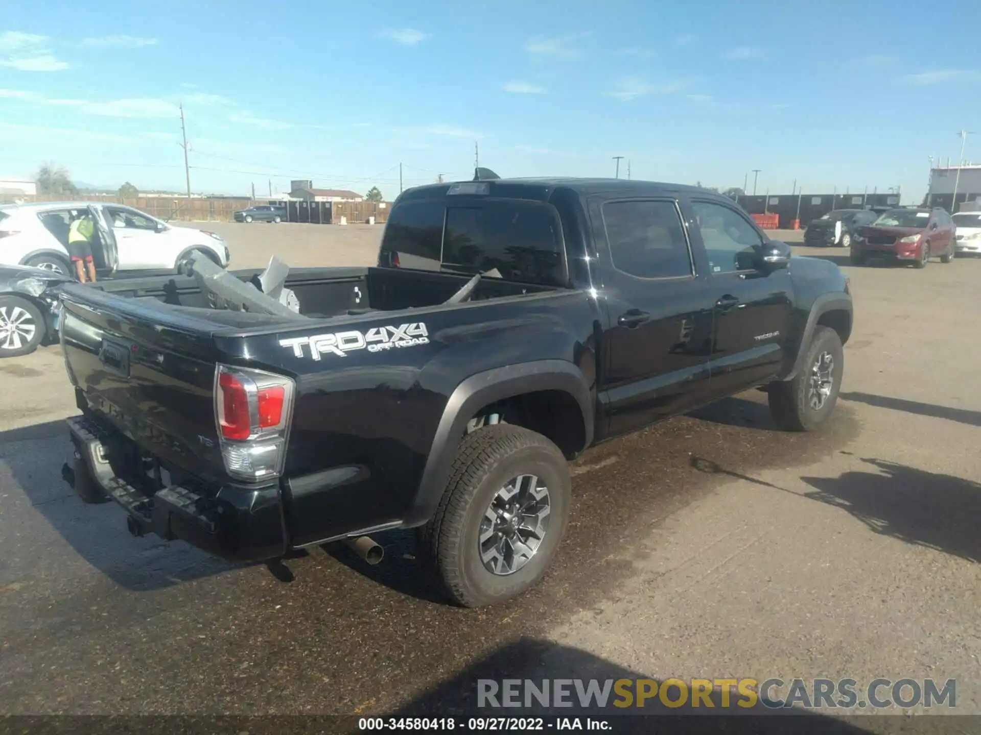 4 Photograph of a damaged car 5TFCZ5AN5MX270901 TOYOTA TACOMA 4WD 2021