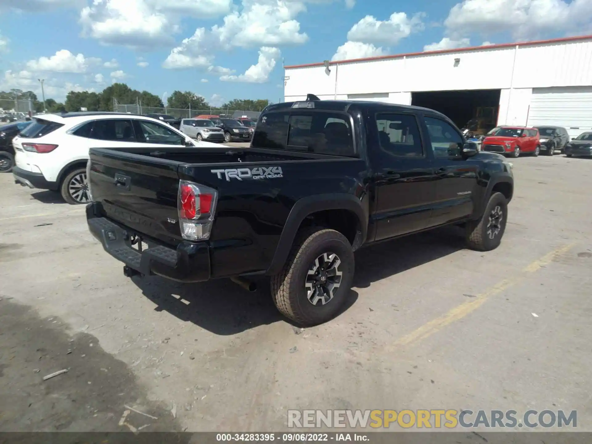 4 Photograph of a damaged car 5TFCZ5AN6MX267005 TOYOTA TACOMA 4WD 2021