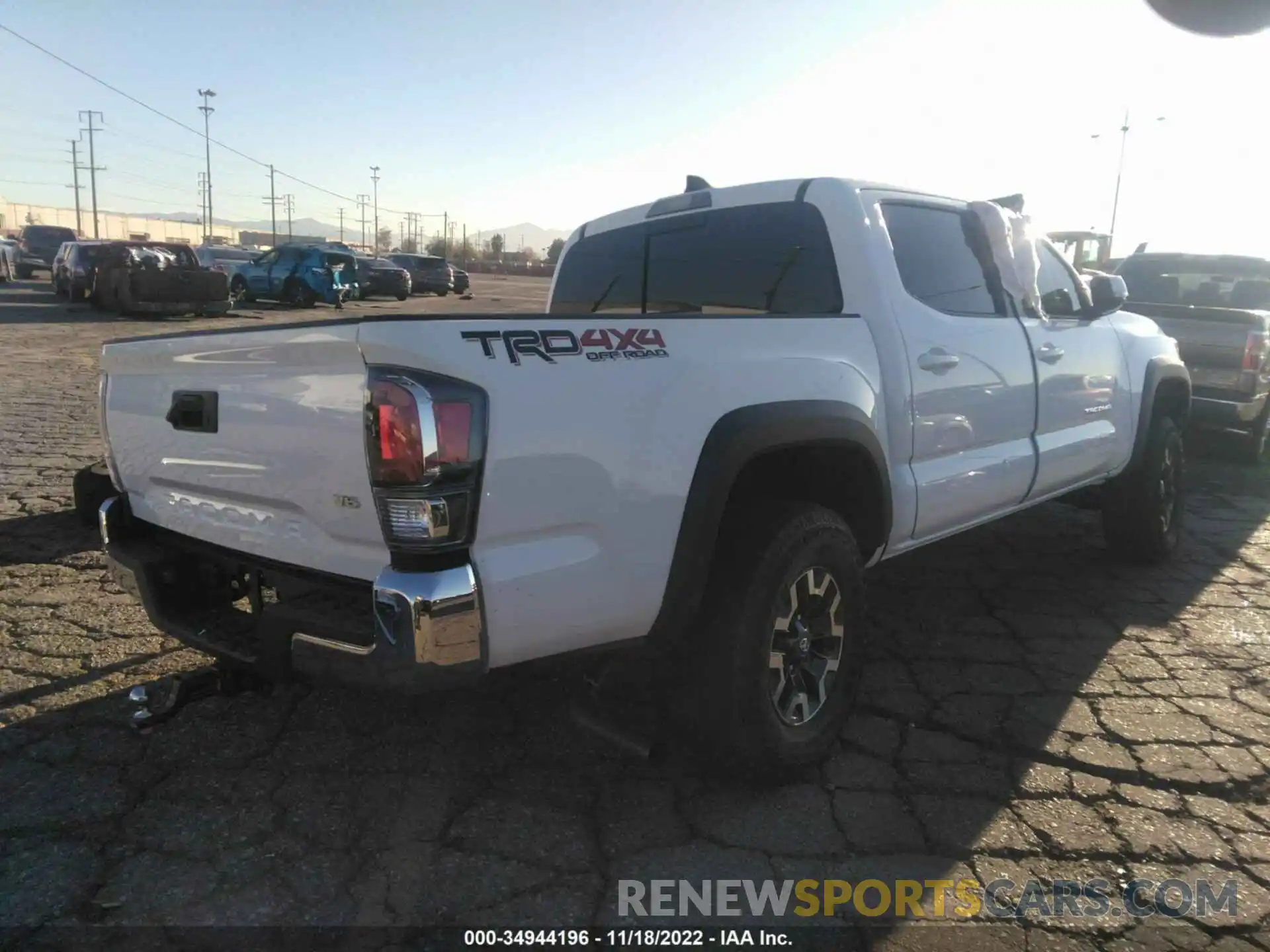 4 Photograph of a damaged car 3TYCZ5AN2NT088973 TOYOTA TACOMA 4WD 2022