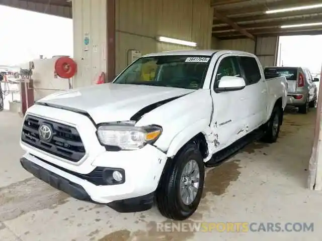 2 Photograph of a damaged car 3TMCZ5AN7KM241645 TOYOTA TACOMA DOU 2019