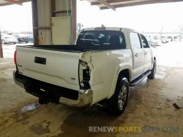 4 Photograph of a damaged car 3TMCZ5AN7KM241645 TOYOTA TACOMA DOU 2019