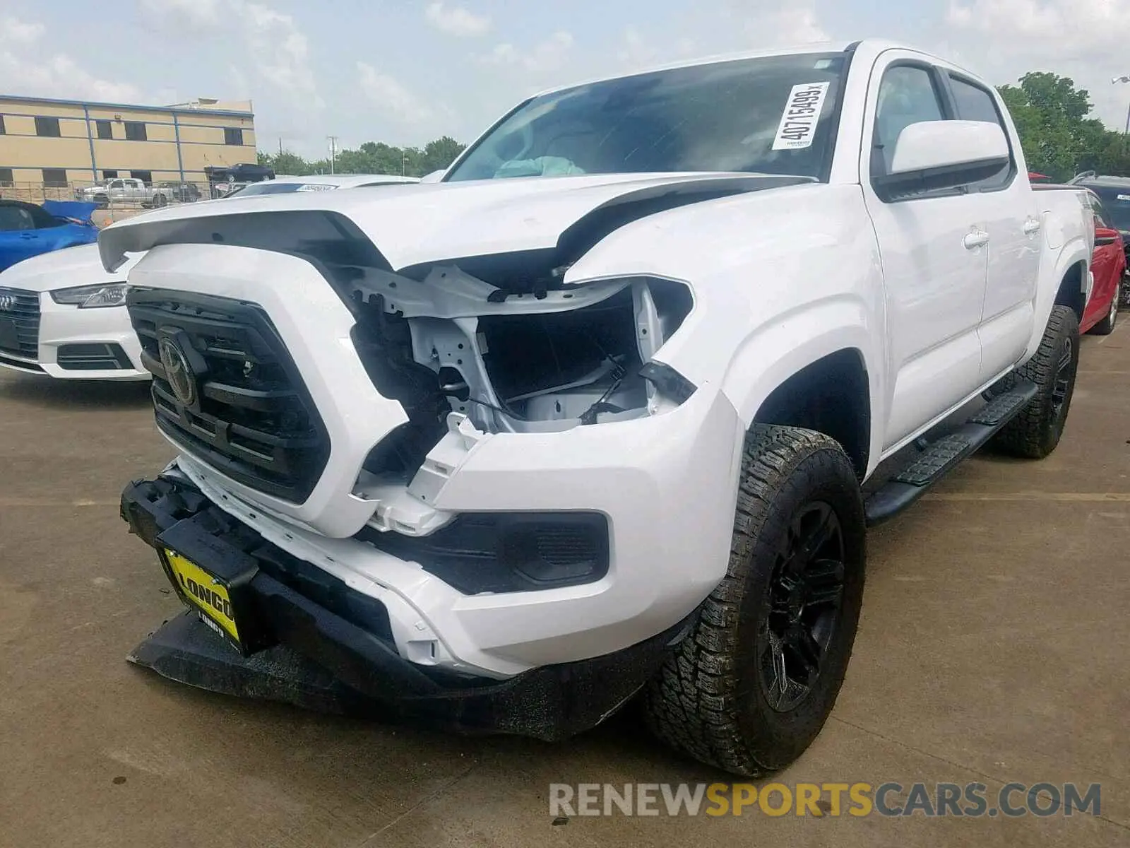 2 Photograph of a damaged car 5TFAX5GNXKX152585 TOYOTA TACOMA DOU 2019