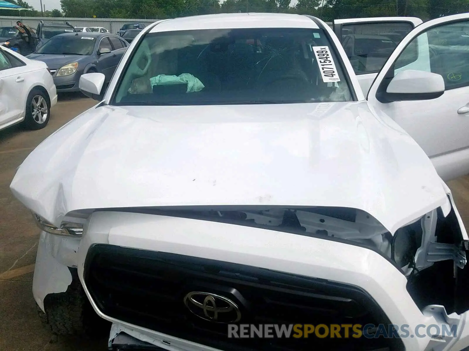 7 Photograph of a damaged car 5TFAX5GNXKX152585 TOYOTA TACOMA DOU 2019