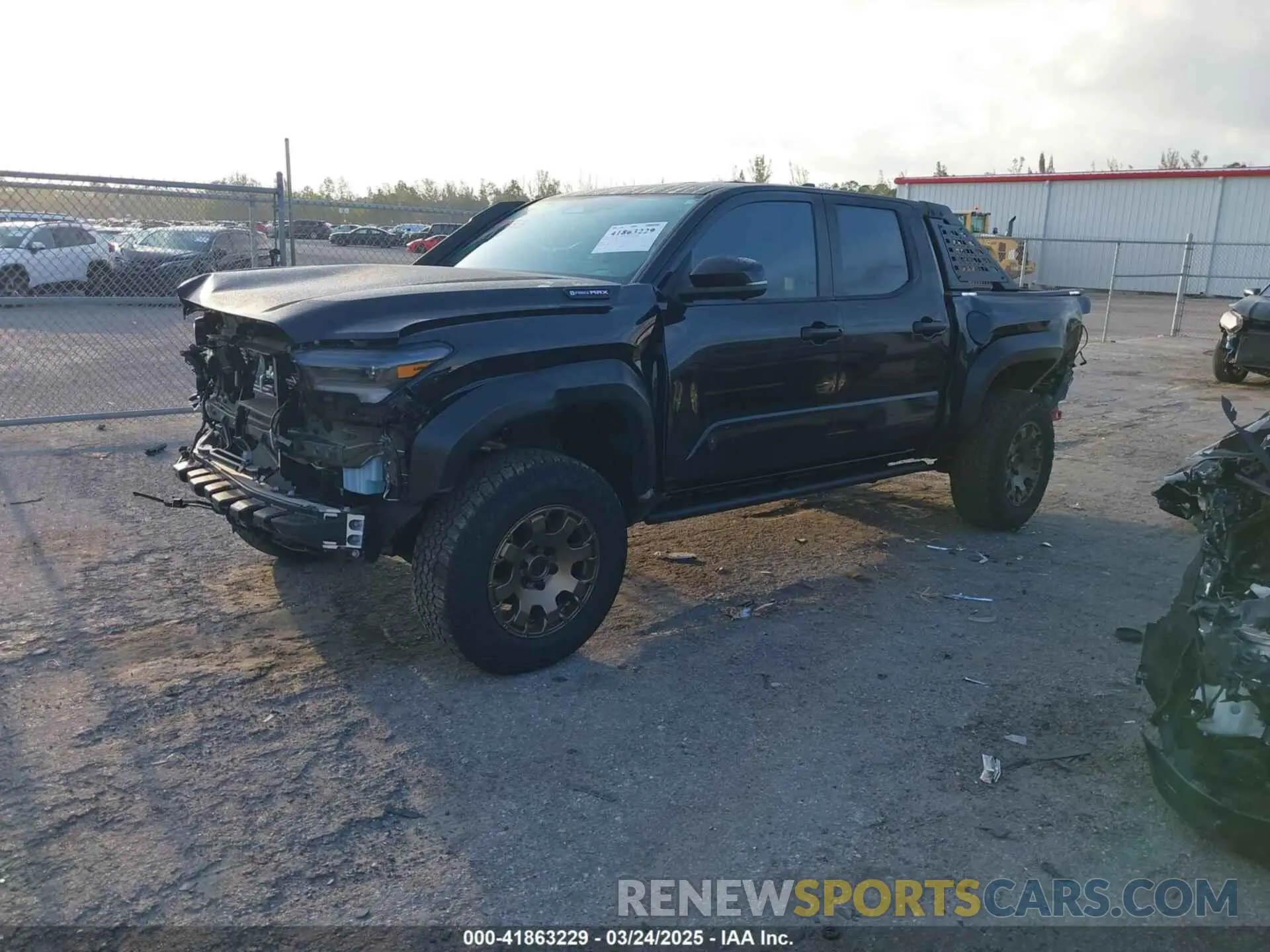 2 Photograph of a damaged car 3TYLF5LN7RT000933 TOYOTA TACOMA HYBRID 2024