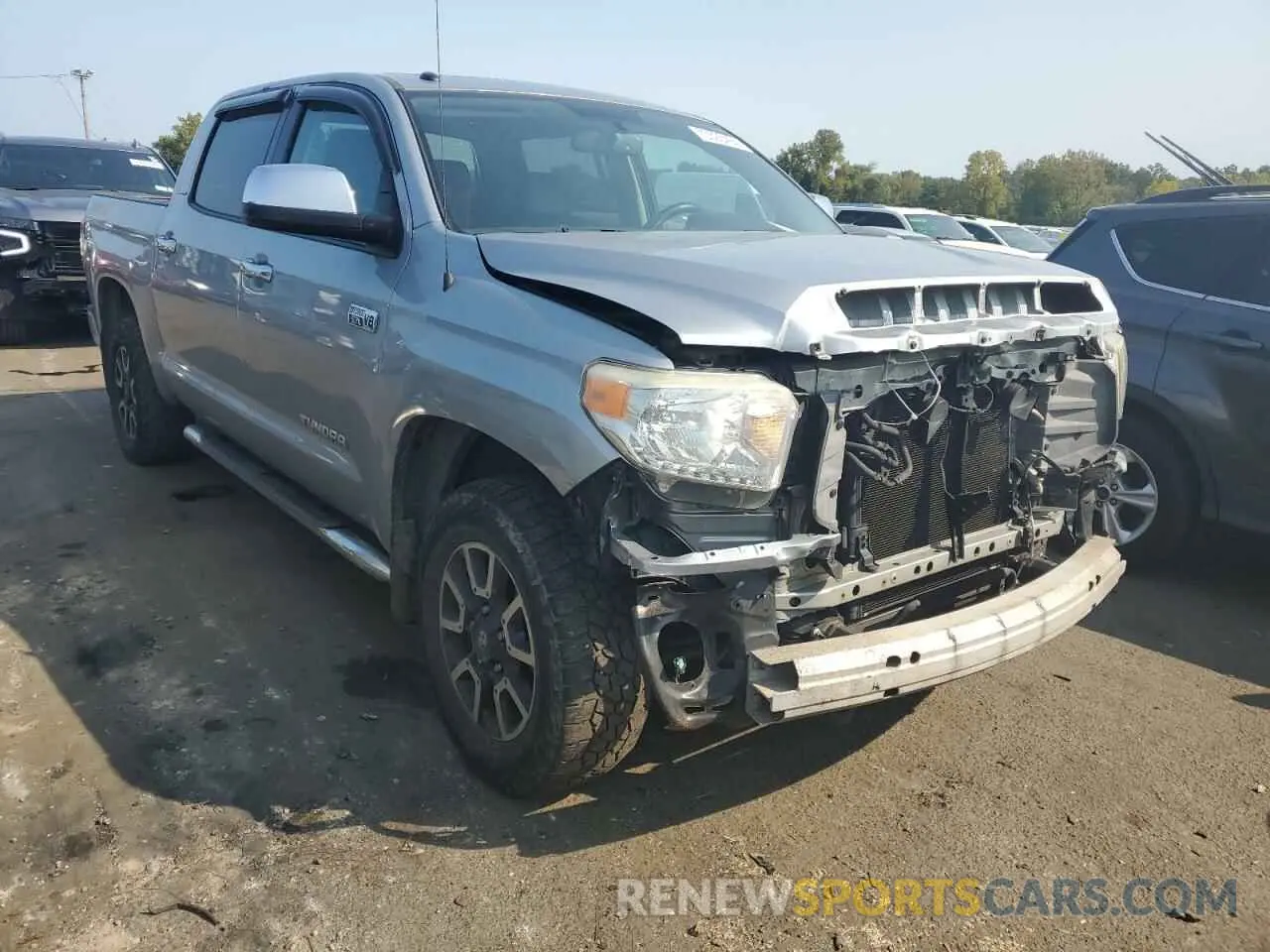 4 Photograph of a damaged car 5TFHY5F13EX371516 TOYOTA TUNDRA 2014