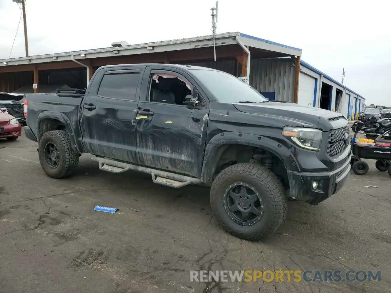4 Photograph of a damaged car 5TFAY5F19KX823613 TOYOTA TUNDRA 2019