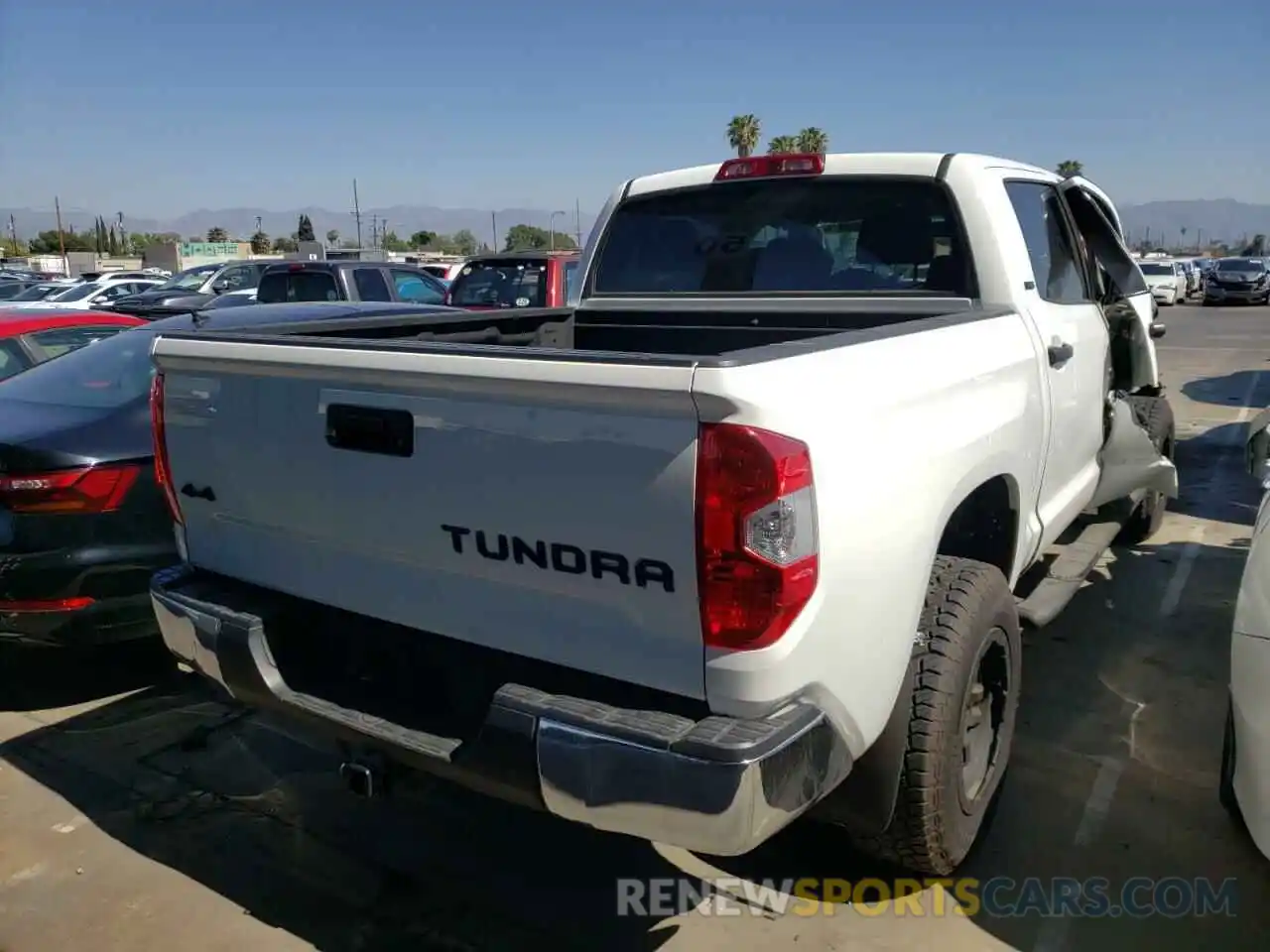 4 Photograph of a damaged car 5TFDW5F18KX855035 TOYOTA TUNDRA 2019