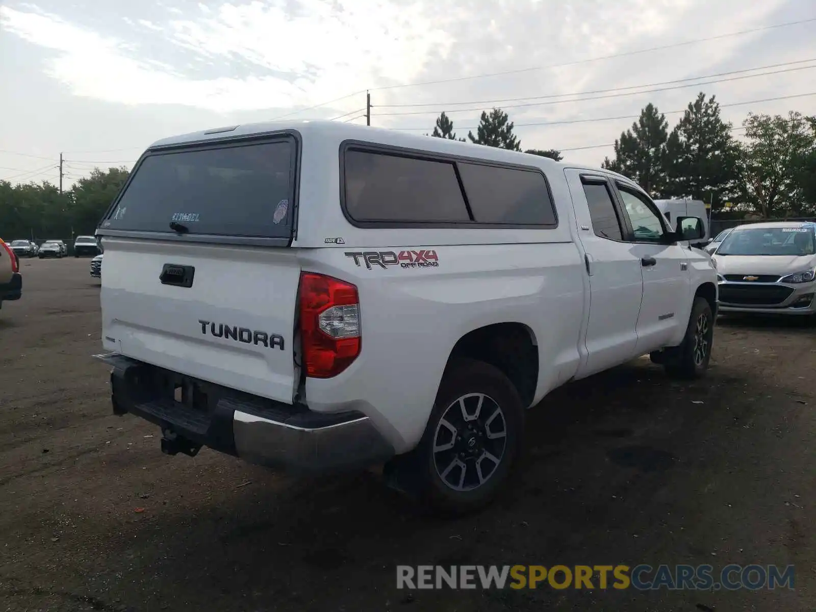 4 Photograph of a damaged car 5TFUY5F11KX860992 TOYOTA TUNDRA 2019