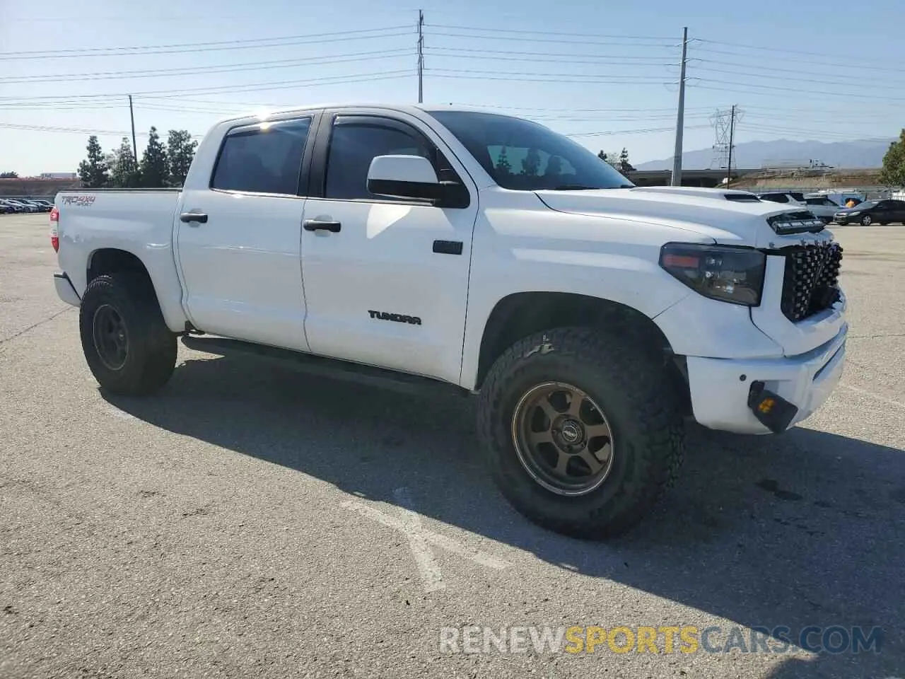 4 Photograph of a damaged car 5TFDY5F17LX934336 TOYOTA TUNDRA 2020