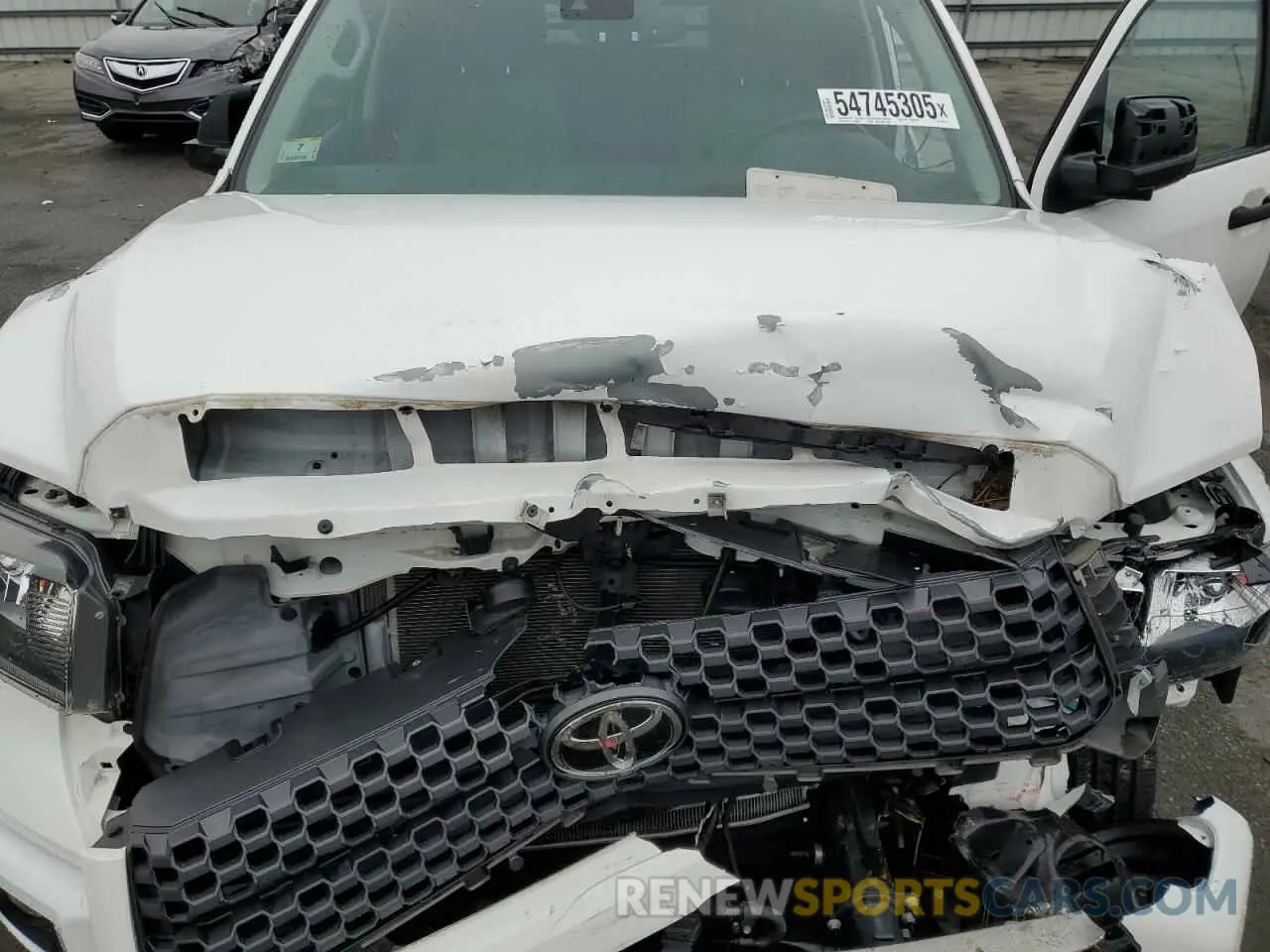 11 Photograph of a damaged car 5TFUY5F14LX925075 TOYOTA TUNDRA 2020