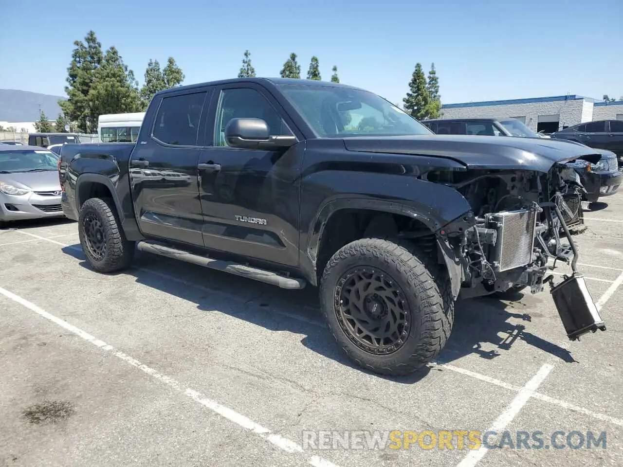 4 Photograph of a damaged car 5TFLA5DB3NX027677 TOYOTA TUNDRA 2022