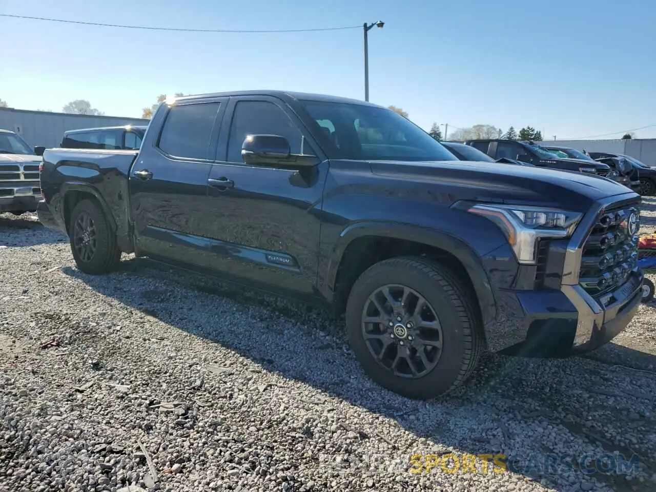 4 Photograph of a damaged car 5TFNA5EC5NX007477 TOYOTA TUNDRA 2022