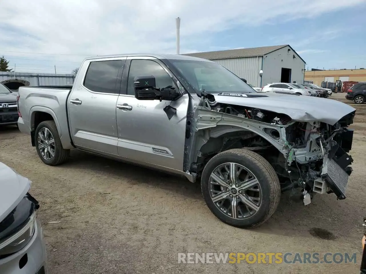 4 Photograph of a damaged car 5TFVC5DB8NX011400 TOYOTA TUNDRA 2022