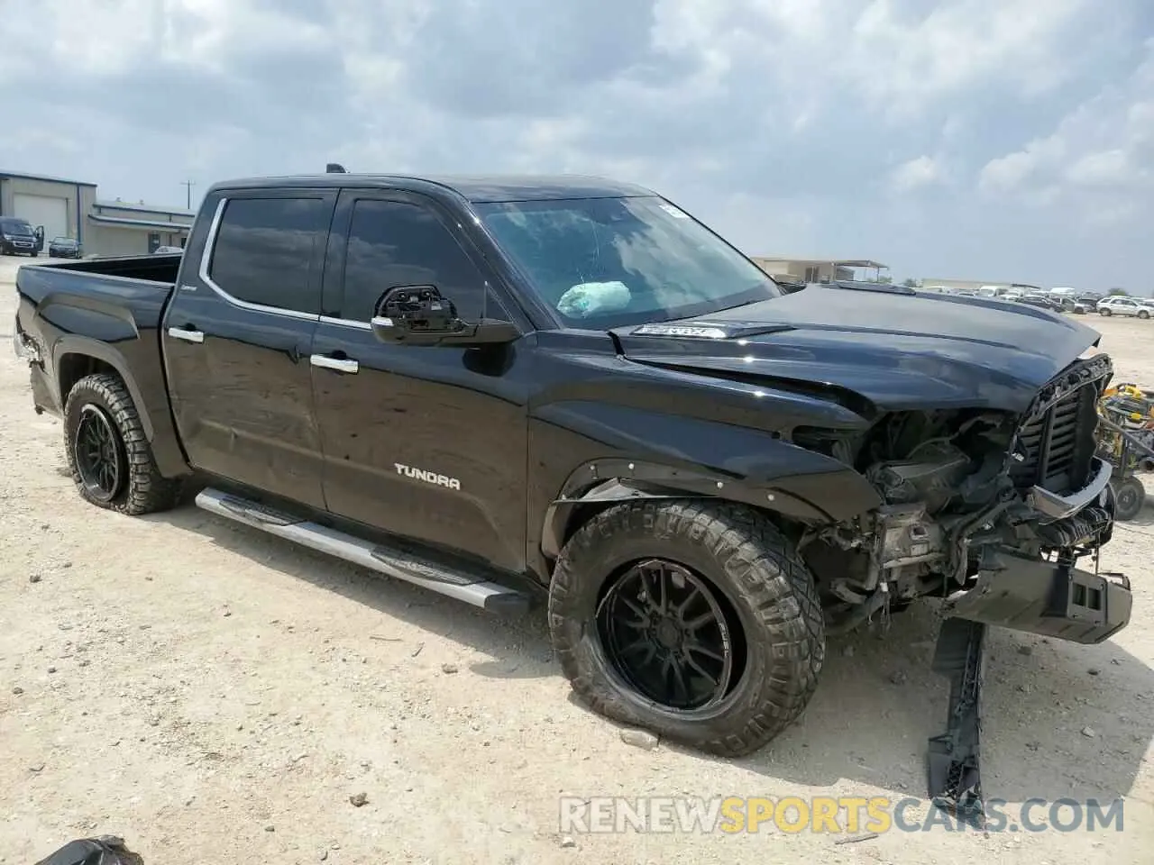 4 Photograph of a damaged car 5TFJC5DB7PX019019 TOYOTA TUNDRA 2023