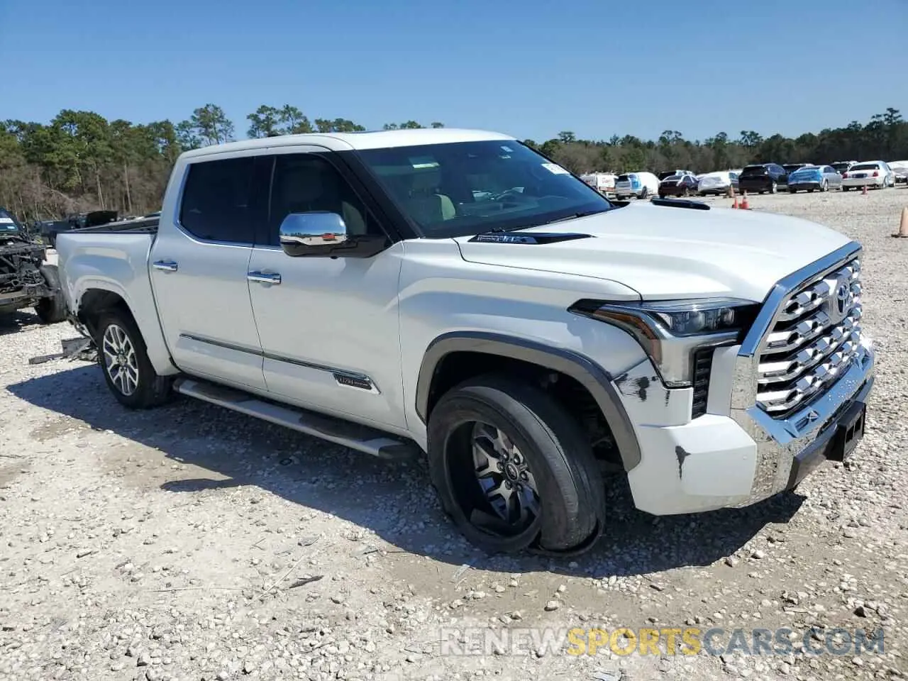 4 Photograph of a damaged car 5TFMC5AB9PX002272 TOYOTA TUNDRA 2023