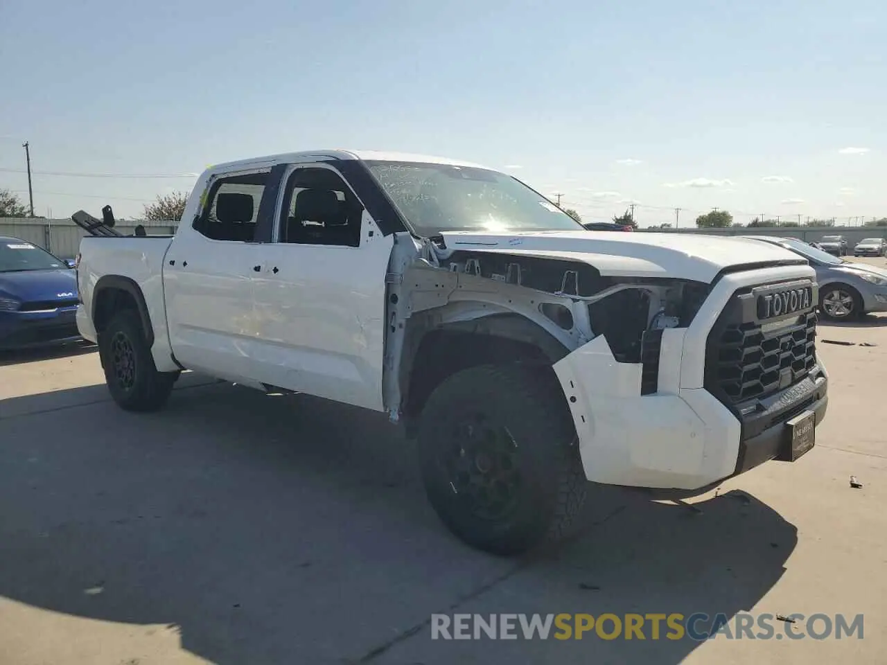 4 Photograph of a damaged car 5TFPC5DB4PX025581 TOYOTA TUNDRA 2023