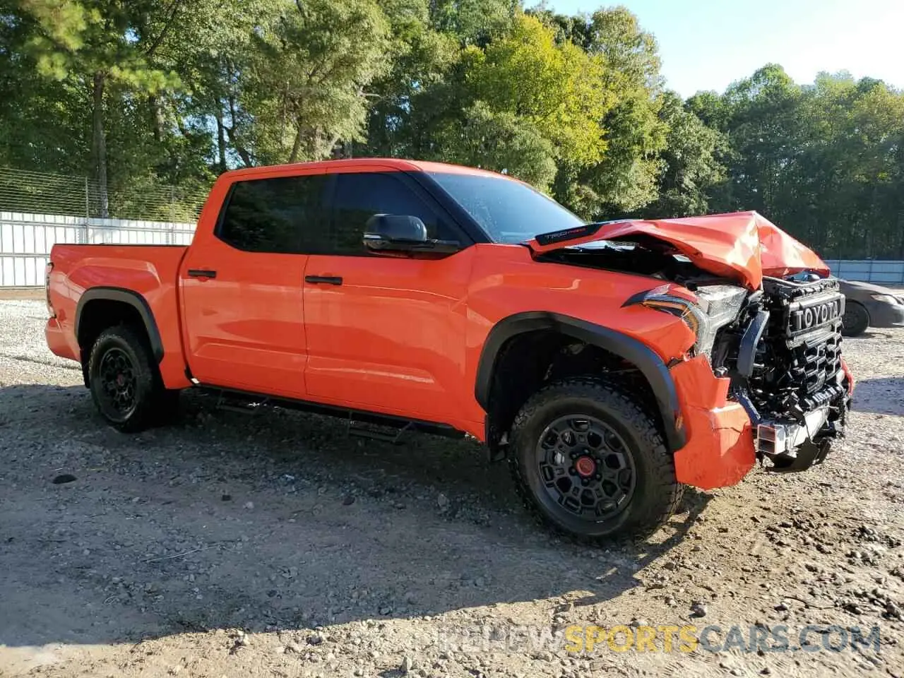 4 Photograph of a damaged car 5TFPC5DB9PX030713 TOYOTA TUNDRA 2023