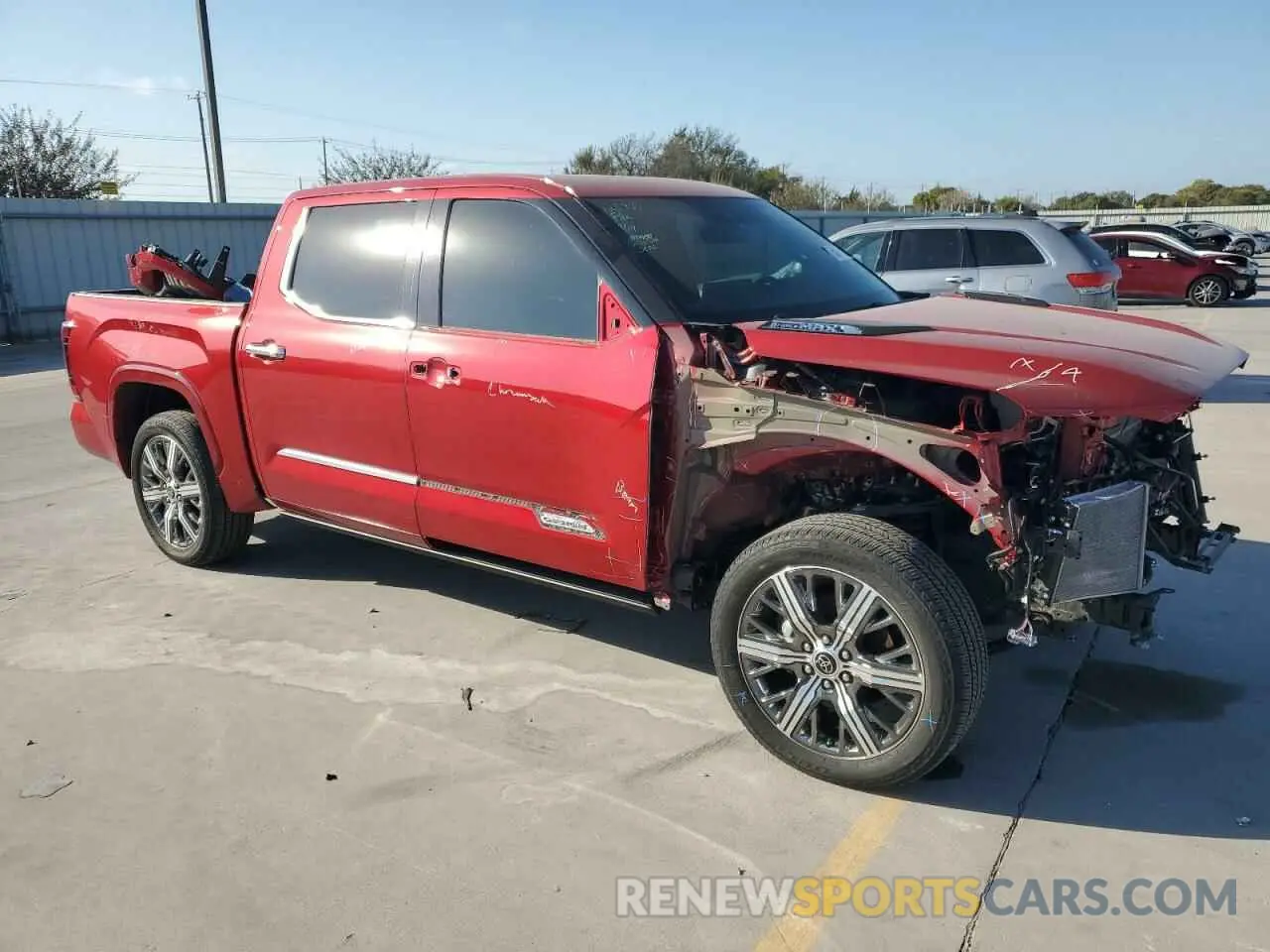 4 Photograph of a damaged car 5TFVC5DB5PX030960 TOYOTA TUNDRA 2023