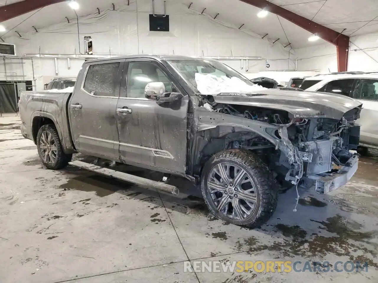 4 Photograph of a damaged car 5TFVC5DB6PX033074 TOYOTA TUNDRA 2023