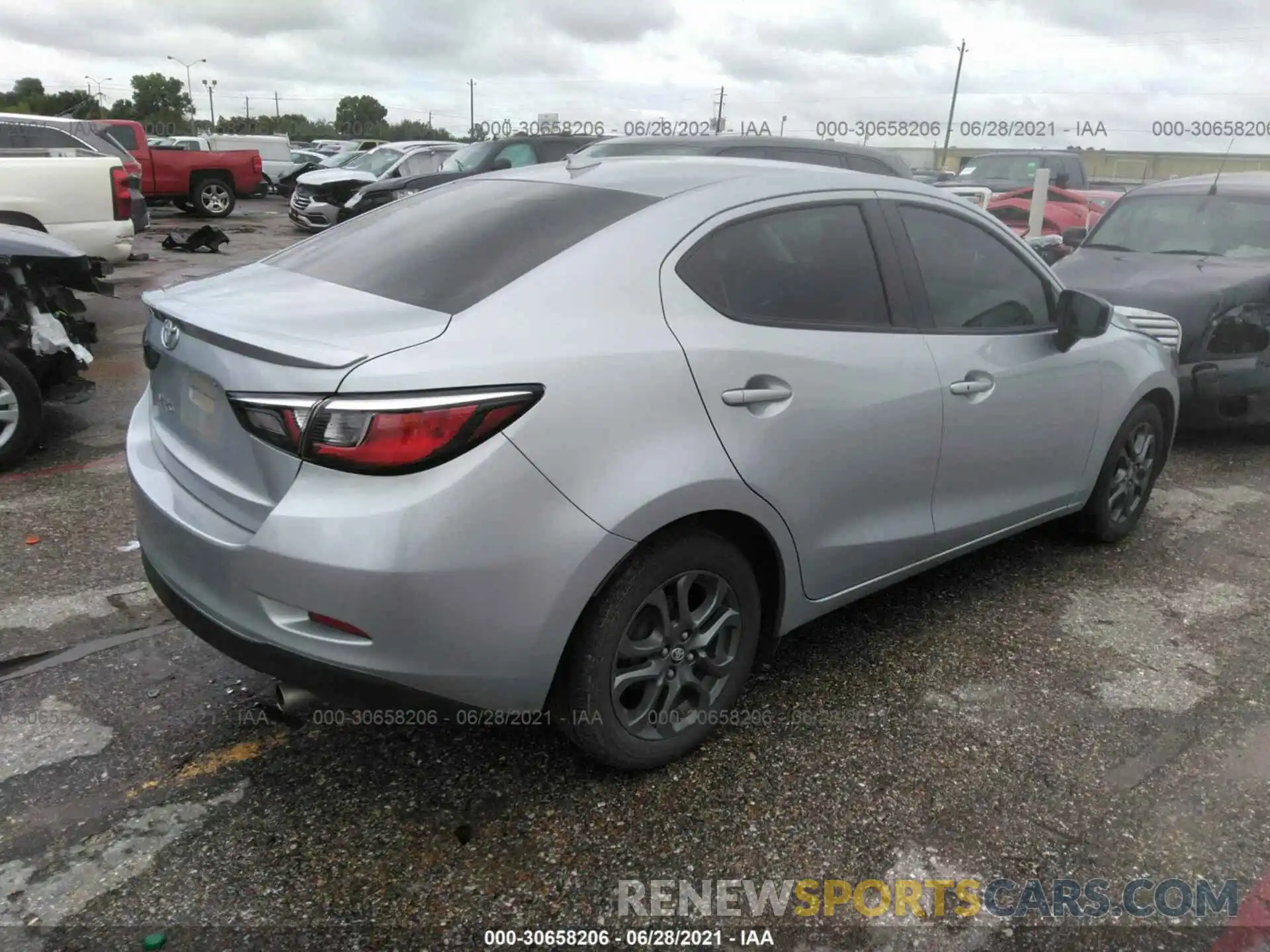 4 Photograph of a damaged car 3MYDLBYV1KY522571 TOYOTA YARIS SEDAN 2019