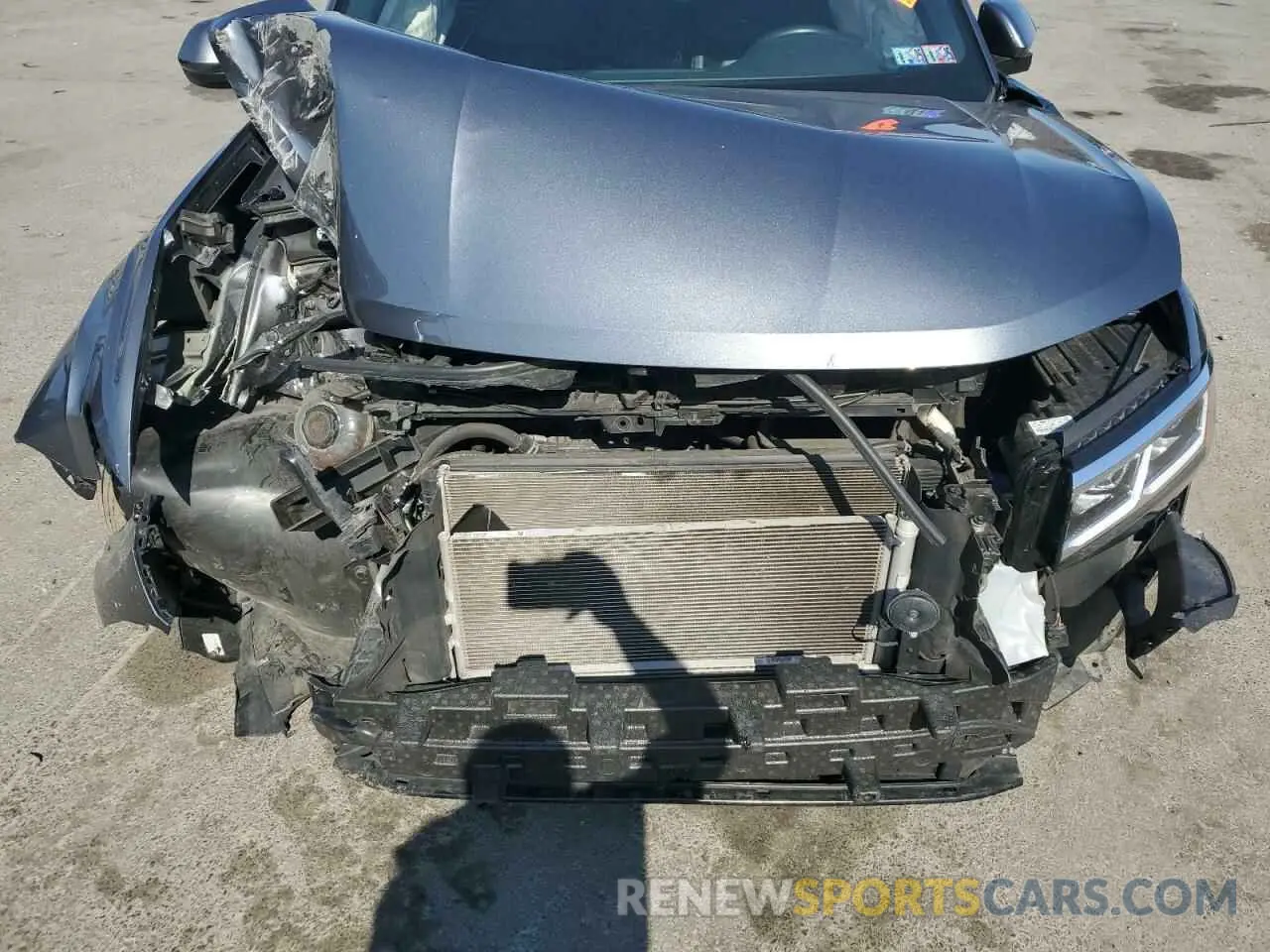 12 Photograph of a damaged car 1V26C2CA7LC203597 VOLKSWAGEN ATLAS 2020