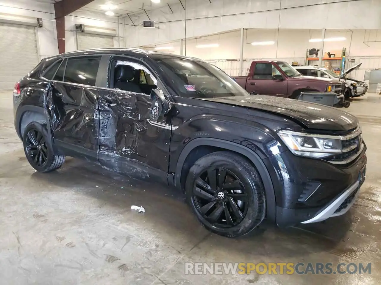 4 Photograph of a damaged car 1V2HE2CA0PC222288 VOLKSWAGEN ATLAS 2023