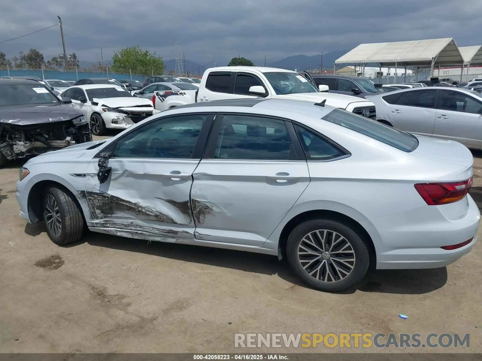 14 Photograph of a damaged car 3VWE57BUXKM063071 VOLKSWAGEN JETTA 2019