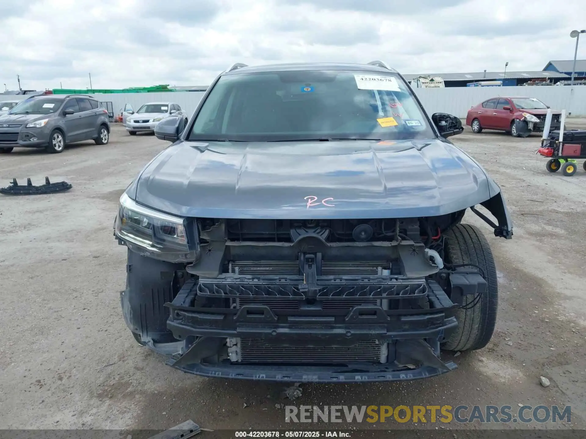 12 Photograph of a damaged car 3VVRX7B22NM036448 VOLKSWAGEN TAOS 2022