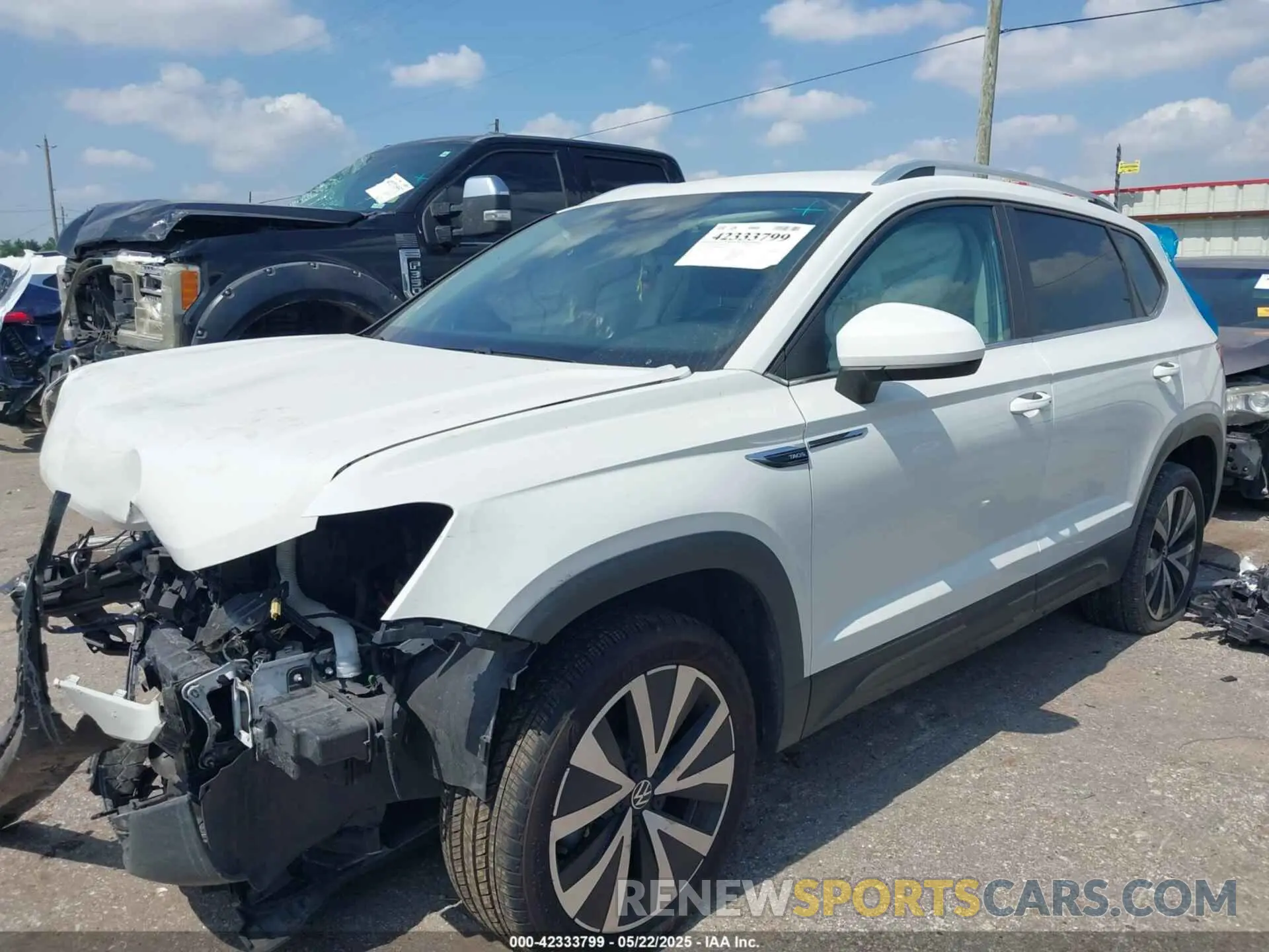 2 Photograph of a damaged car 3VVSX7B23NM014878 VOLKSWAGEN TAOS 2022