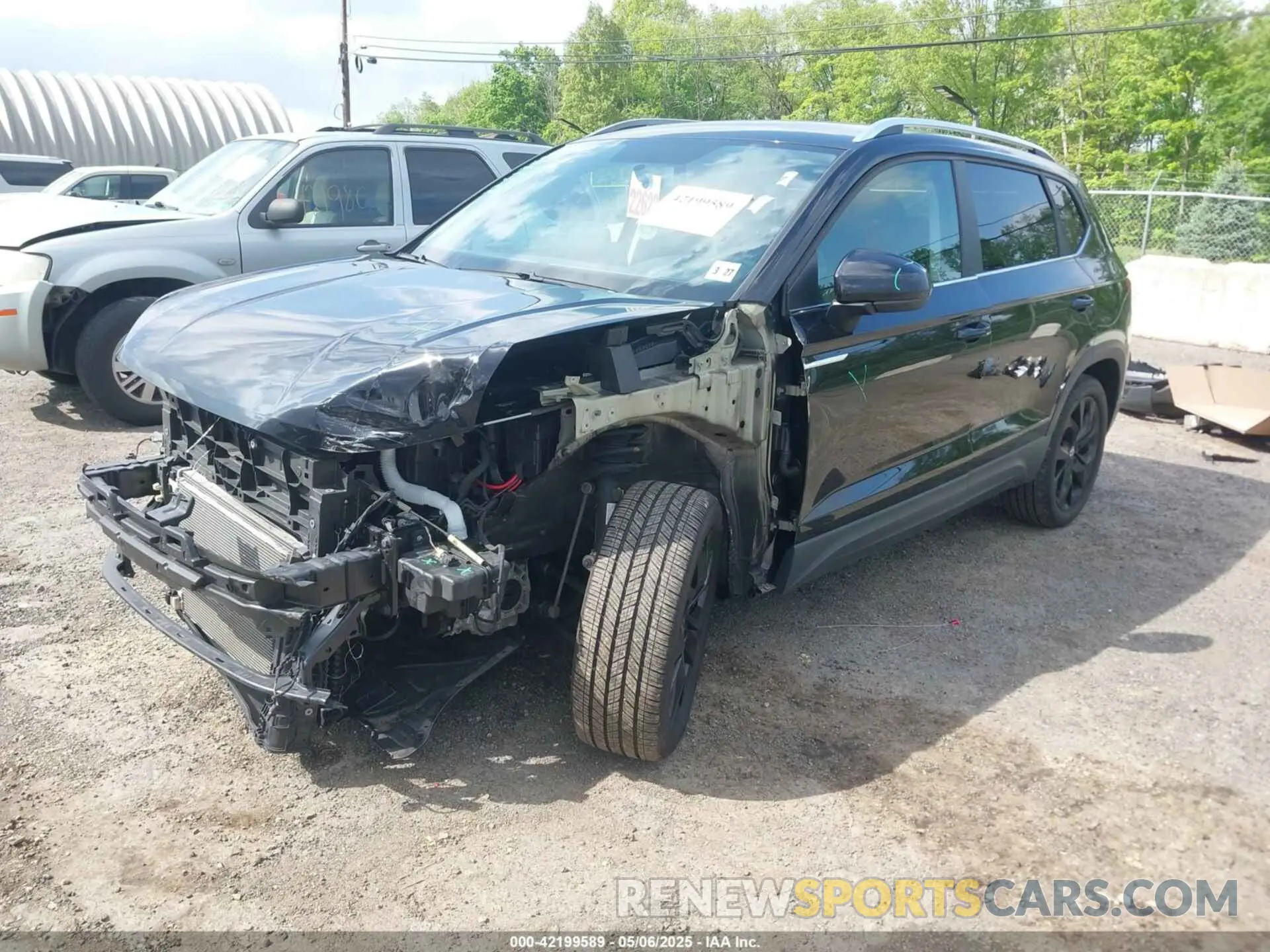 2 Photograph of a damaged car 3VVWX7B24NM049589 VOLKSWAGEN TAOS 2022