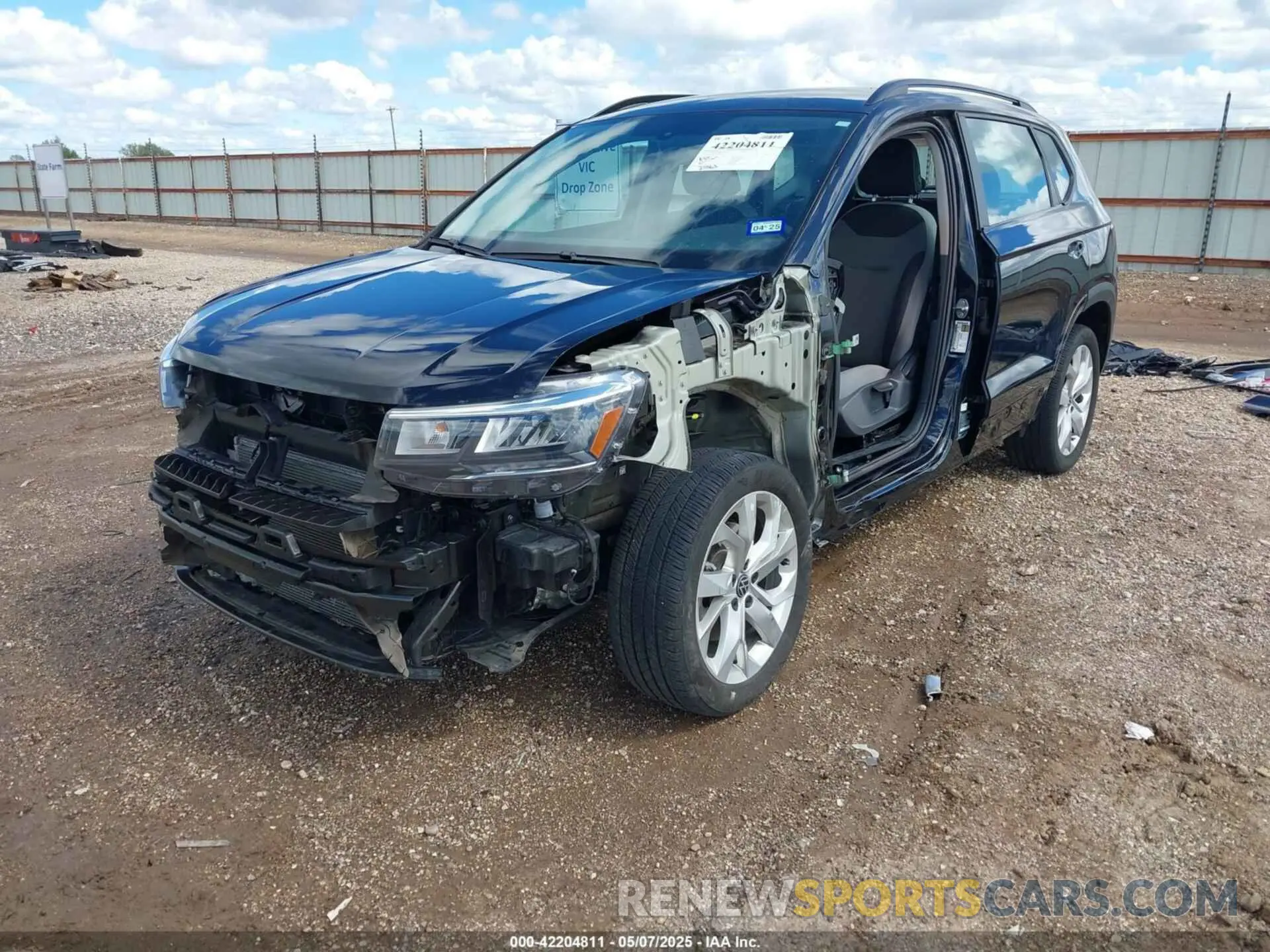 2 Photograph of a damaged car 3VVAX7B23PM309459 VOLKSWAGEN TAOS 2023
