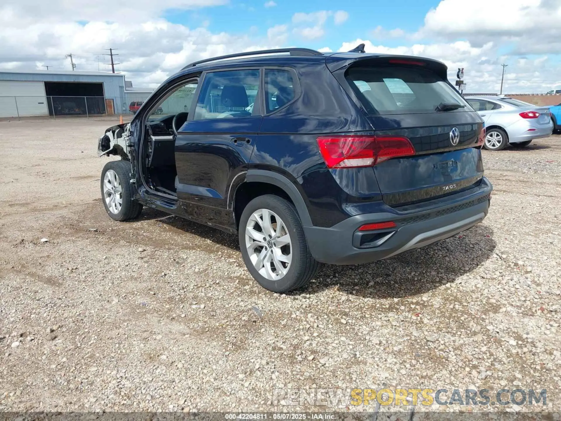 3 Photograph of a damaged car 3VVAX7B23PM309459 VOLKSWAGEN TAOS 2023