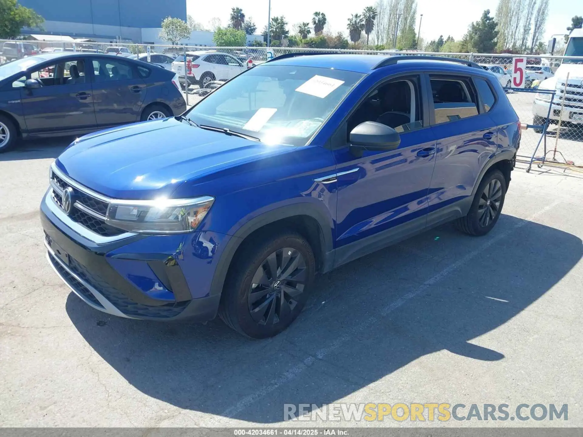 2 Photograph of a damaged car 3VVDX7B24PM382465 VOLKSWAGEN TAOS 2023
