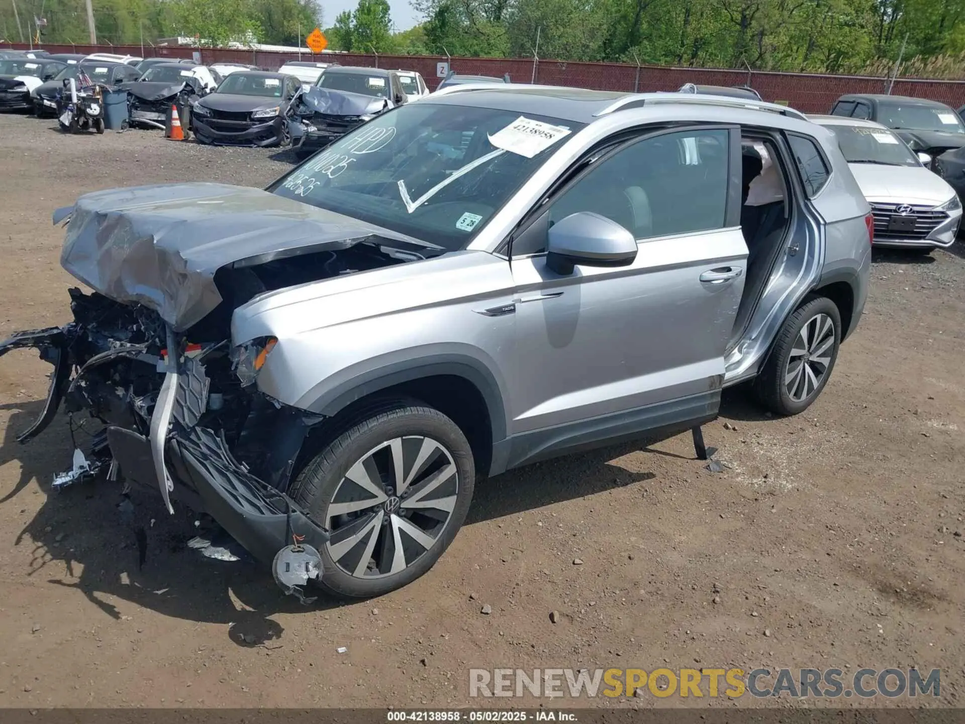 2 Photograph of a damaged car 3VVEX7B24PM342309 VOLKSWAGEN TAOS 2023