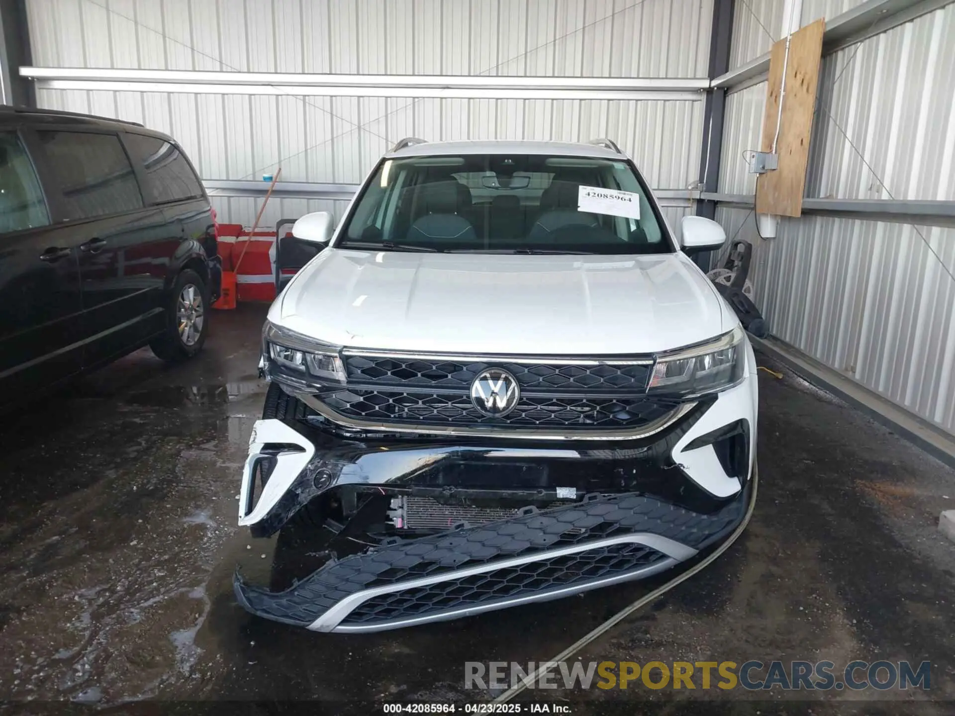 12 Photograph of a damaged car 3VVYX7B20PM318747 VOLKSWAGEN TAOS 2023
