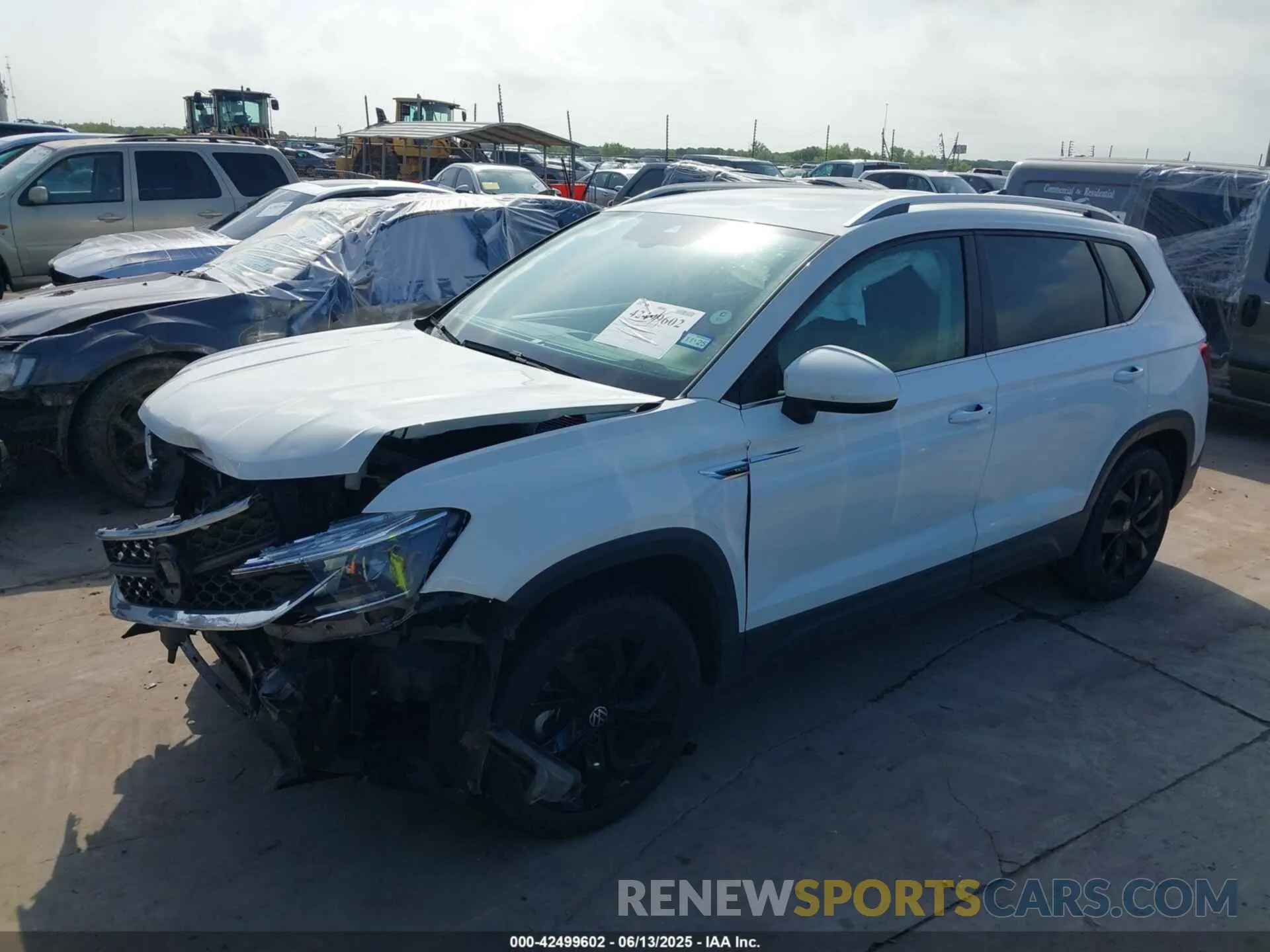 2 Photograph of a damaged car 3VVSX7B29RM001364 VOLKSWAGEN TAOS 2024