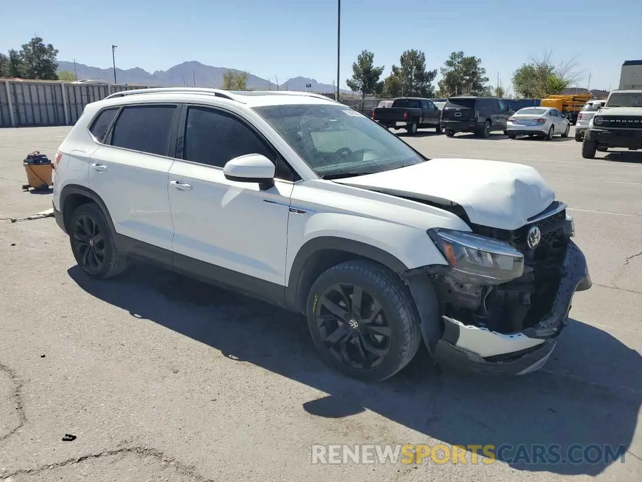 4 Photograph of a damaged car 3VVLX7B27NM023975 VOLKSWAGEN TAOS SE IQ 2022