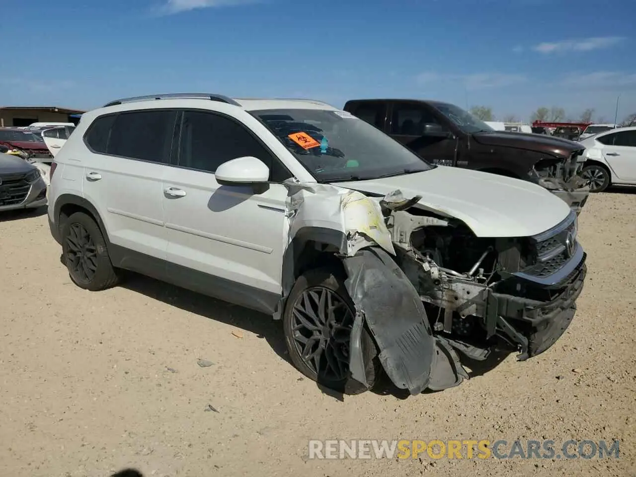 4 Photograph of a damaged car 3VV1X7B26NM002056 VOLKSWAGEN TAOS SEL 2022