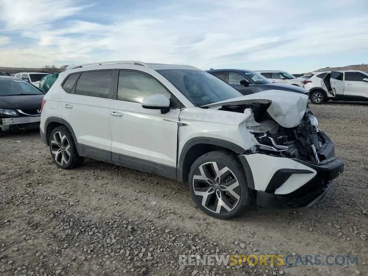4 Photograph of a damaged car 3VV2X7B20NM036918 VOLKSWAGEN TAOS SEL 2022
